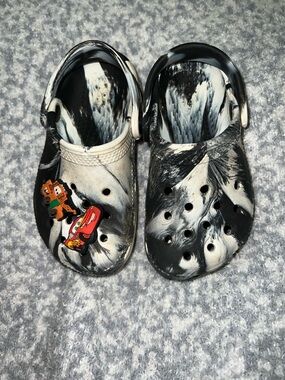 CROCS Kids Black & White Marbled Clogs with Cartoon Charms